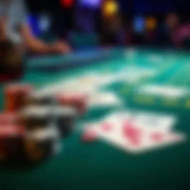 A close-up view of poker chips and cards laid out on a gaming table.
